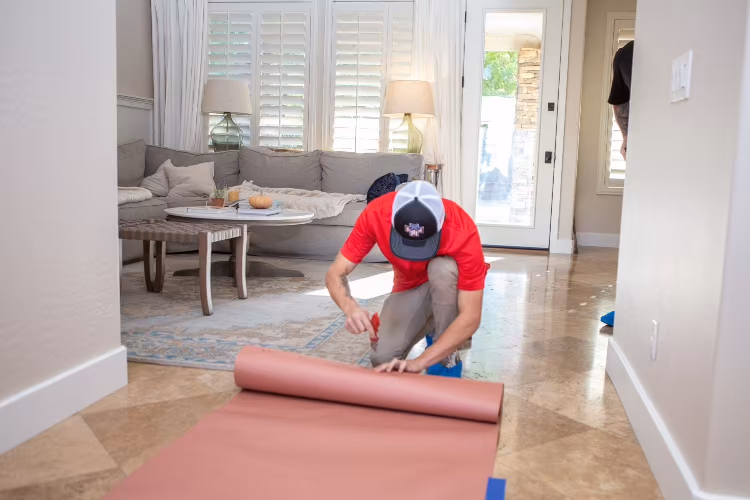 Technician working inside a home